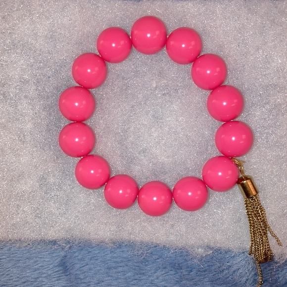 NEW- Price drop-Fuchsia stretch bracelet with tassels - Picture 2 of 3